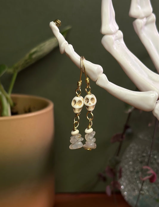 14k gold filled wire earrings with skulls sitting on top of howlite beading and agate chips